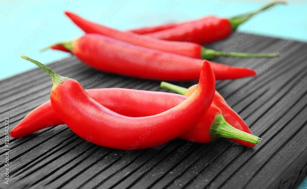 Fresh peppers on a cutting  board