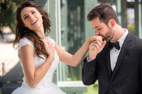 Fotografía Handsome groom charming kiss on wife hand true love romance chivalry