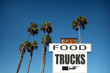 food truck sign with palm trees