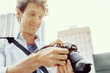 © Sergey Nivens - Male photographer taking picture