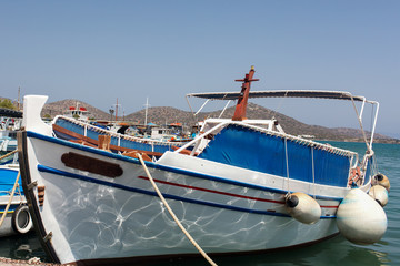 Wall Mural - close-up fishing boat in the marina