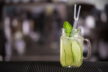 Poster - Cocktail in glass jar on bar counter