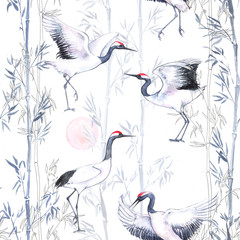  Hand-drawn watercolor seamless pattern with white Japanese dancing cranes. Repeated background with delicate birds and bamboo