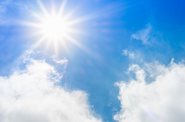 Wall Mural - Looking up at Nice blue sky with sun beam and cloudy,Nature back