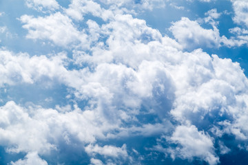 Wall Mural - Aerial view of group of big cloud and sky from airplane,Travelin