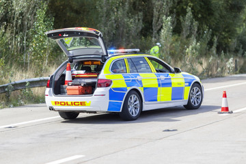 Wall Mural - Police car at motorway accident or crime scene