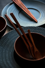 Set Of Japanese Tableware. Black, White Ceramic Plates And Brown Bowls In Japanese Style