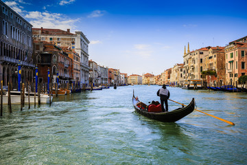 Sticker - Gondolier sailing a gondola and view of the Grand Canal, Venice, Italy