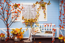 Cozy Country House With Blue Walls And White Window In Autumn