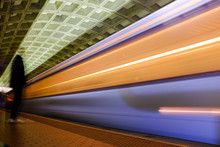 Washington D.C. - Subway Station With Passengers And Train In Motion Blur

