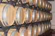 New oak wine barrels on a shelving