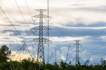 Many high voltage electric pole with  sky, horizontal picture