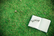 Books on the grass in the park Vintage Tone