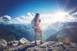 © XtravaganT - Bright sunlight near hiker on mountain top