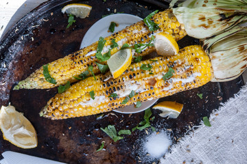 Poster - grilled corn on with lemon, herbs and spices