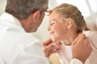 © goodluz - Doctor examining little girl's throat
