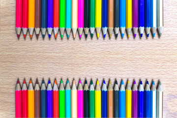 Color pencils on wood background / Colored pencils on wood background with space for your text 