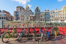 Many Bicycle Parking Near Flower Market In Amsterdam, Netherlands