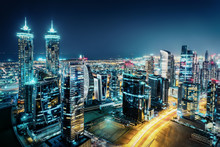 Fantastic View Of A Big City At Night With Illuminated Modern Architecture. Dubai Downtown, United Arab Emirates.