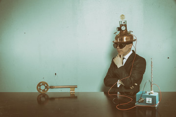 Wall Mural - Vintage businessman sitting at office desk