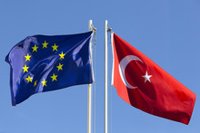 European Union Flag And Flag Of Turkey On Flagpole