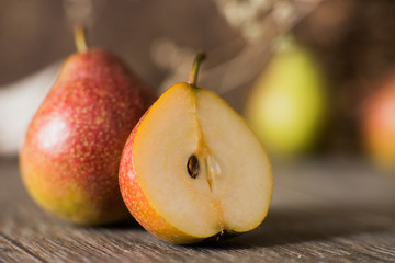 Fresh juicy organic pears on wooden table