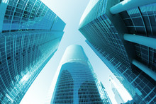 Perspective Of Three Office Skyscrapers In Blue Color