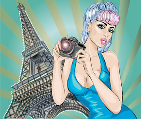 Wall Mural - Pin-up sexy woman takes pictures on camera near Eiffel Tower in Paris