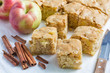 Homemade blondie (blonde) brownies apple cake, square slices on parchment