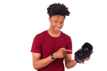 African American young man giving a vr virtual reality headset o