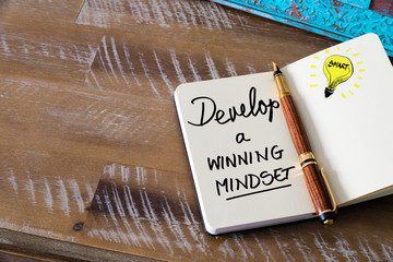 Wall Mural - written text develop a winning mindset