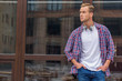 © Yakobchuk Olena - Handsome man standing outside of office building