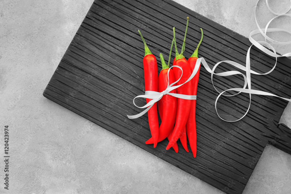 Fresh peppers on a cutting  board