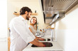 © Minerva Studio - Young couple doing dishes
