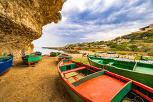Colored Rowing Boats Aground In Italy