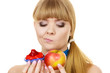 © Voyagerix - Woman choosing fruit or cake make dietary choice