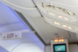Electronic devices off and fasten seat belt sign inside airplane