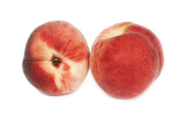 Fresh  peaches isolated on white background. Selective focus.