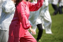 Tai Chi Martial Art Woman With Pink Silk Dress Perform The Exerc