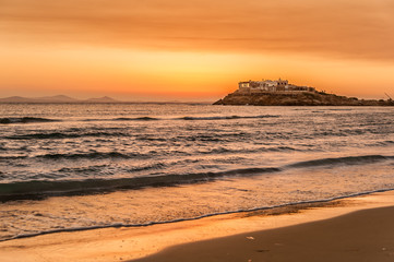 Wall Mural - Sunset over the beach of Naxos