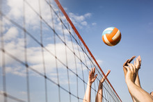 Cropped Image Of People Volleyball At Beach