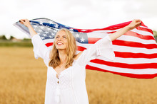 Happy Woman With American Flag On Cereal Field