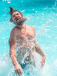 © Volodymyr - Young man splashing water