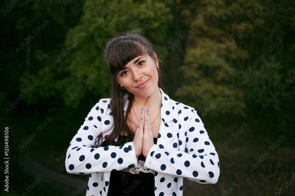 girl holding hands in prayer position Stock Photo | Adobe Stock