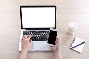 Poster - Top view business woman using mock up laptop and smartphone on w