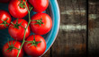 © bojsha - Tomatoes branch on blue plate and old rustic wooden table