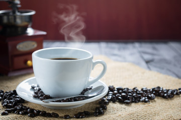 Coffee cup and beans on a rustic background. Coffee Espresso and