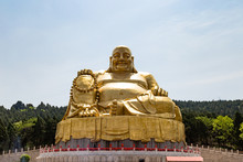 Big Golden Statue Of Buddha In Qianfo Shan, Also Called Mountain Of The One Thousand Buddha, Jinan, Shandong Province, China