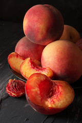 Canvas Print - Peaches on black close-up