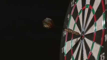 dart hits bullseye in slow motion; shot on phantom flex 4k at 1000 fps